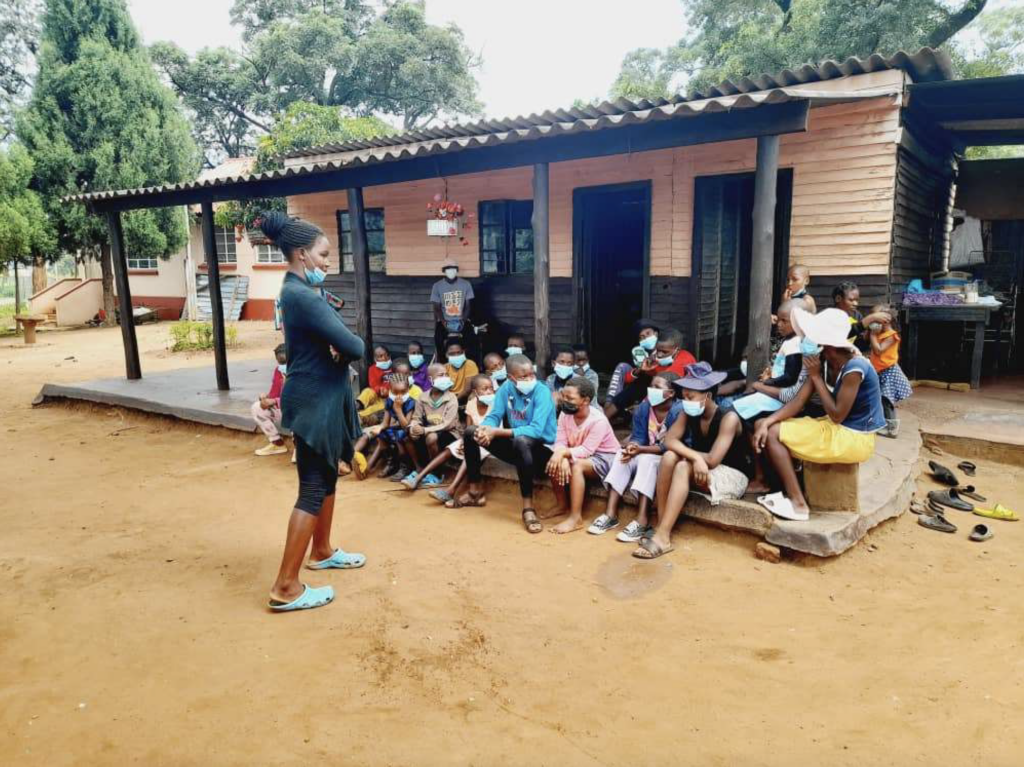 Patience Chingombe our child who is now in Second year University talking to the younger girls